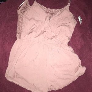 One-piece pink romper